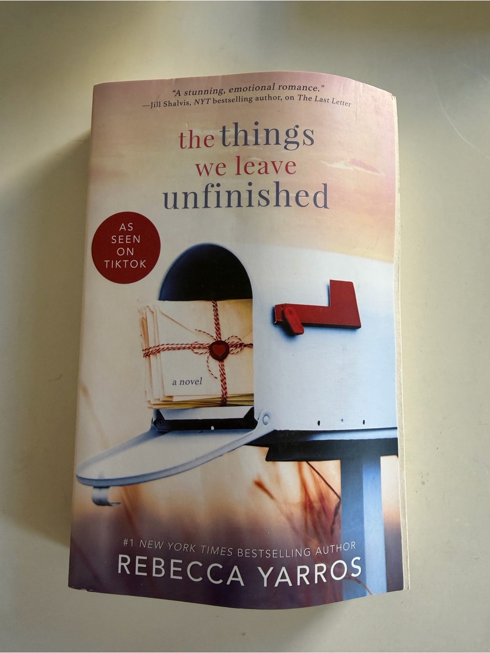 The Things We Leave Unfinished by Rebecca Yarros - Soft Pastel Cover
